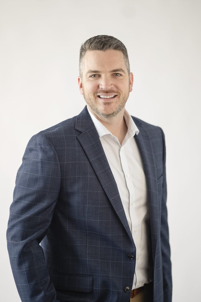 A headshot of founder Chris Pollock